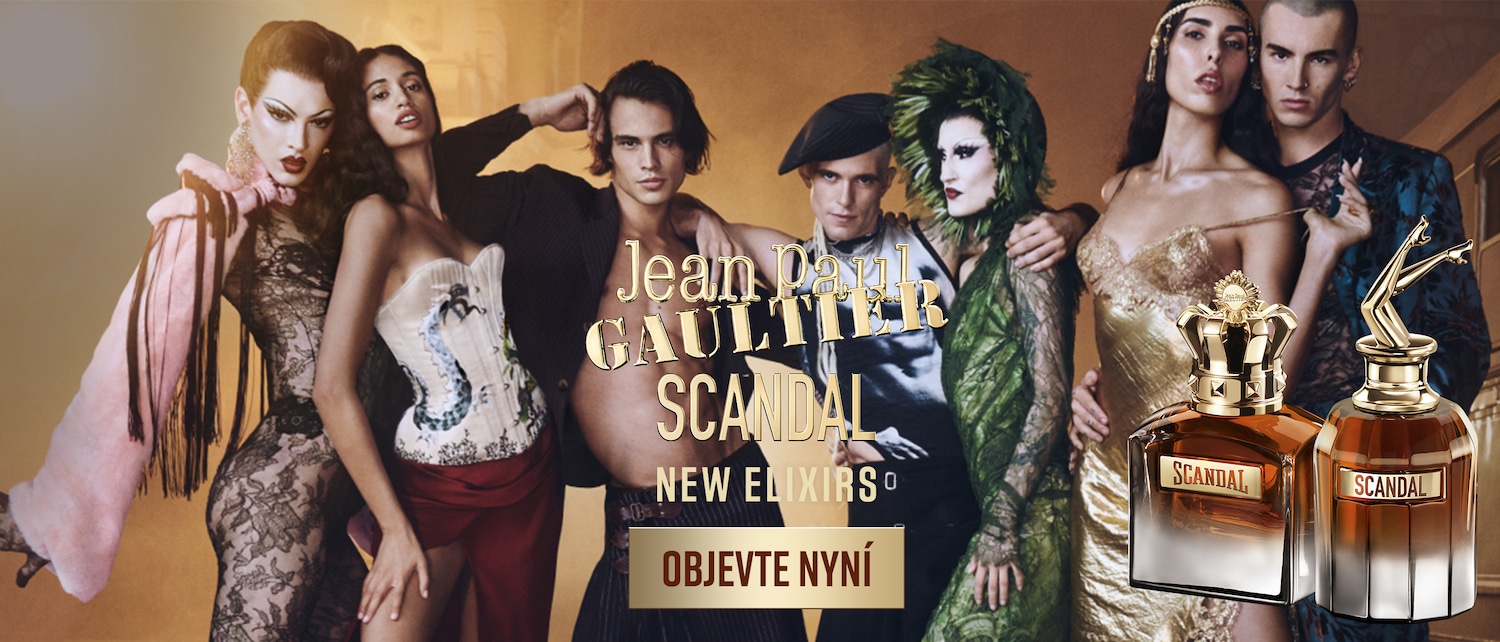 Na reklamní fotografii je skupina mužů a žen oblečených do extravagantních kostýmů, v popředí jsou flakony parfému Jean Paul Gaultier Scandal New Elixirs, text říká: Objevte nyní.