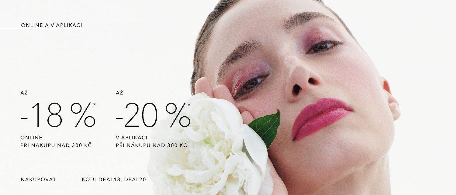 Close-up of a woman with pink eyeshadow and lipstick, holding a white flower, advertising up to 18% off online or 20% off in the app for purchases over 300 Kč, use code DEAL18 or DEAL20 to shop now.