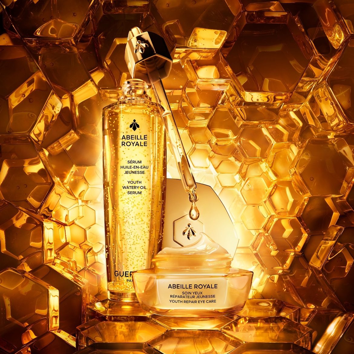 Zlatavá sada péče o pleť Abeille Royale s omlazujícím sérem a očním krémem pro mladistvý vzhled.